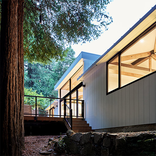 Old Mill residence in Mill Valley - mid-century modern home with floor-to-ceiling glass, exposed wood beam ceilings, and seamless indoor-outdoor living nestled among towering redwood trees